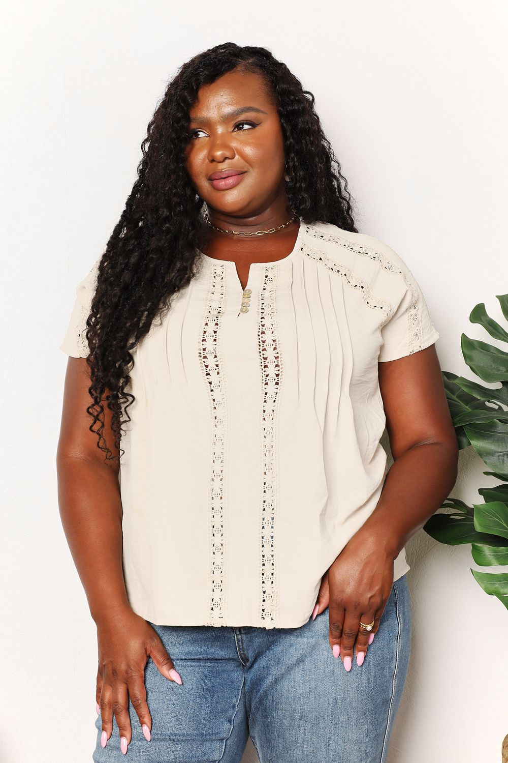 Women's boho chic crochet button-down short sleeve top, trendy summer blouse with a relaxed fit and stylish design.