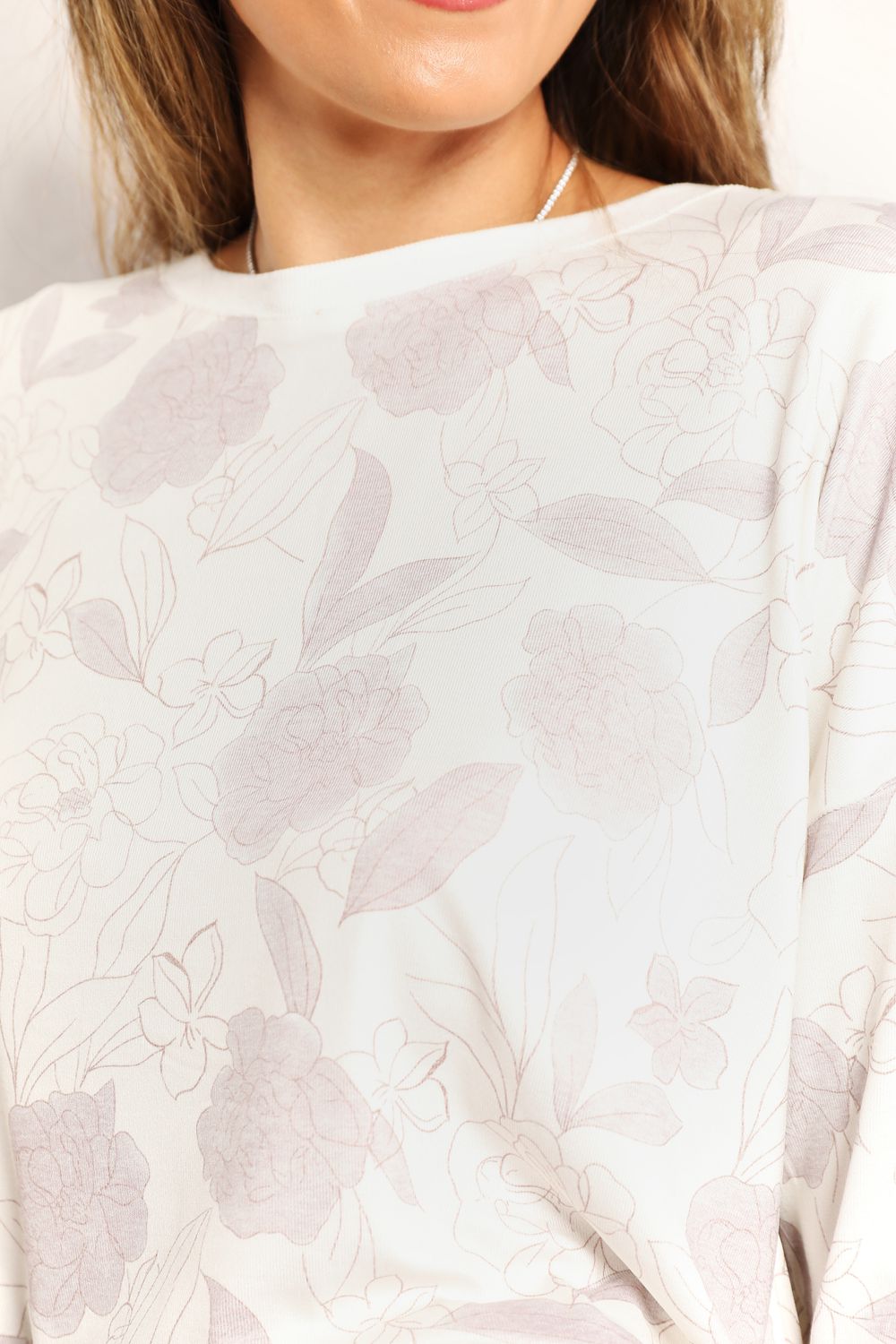 Women’s floral long sleeve top and shorts loungewear set by Plush Fashion Hub, featuring a comfortable and stylish design.