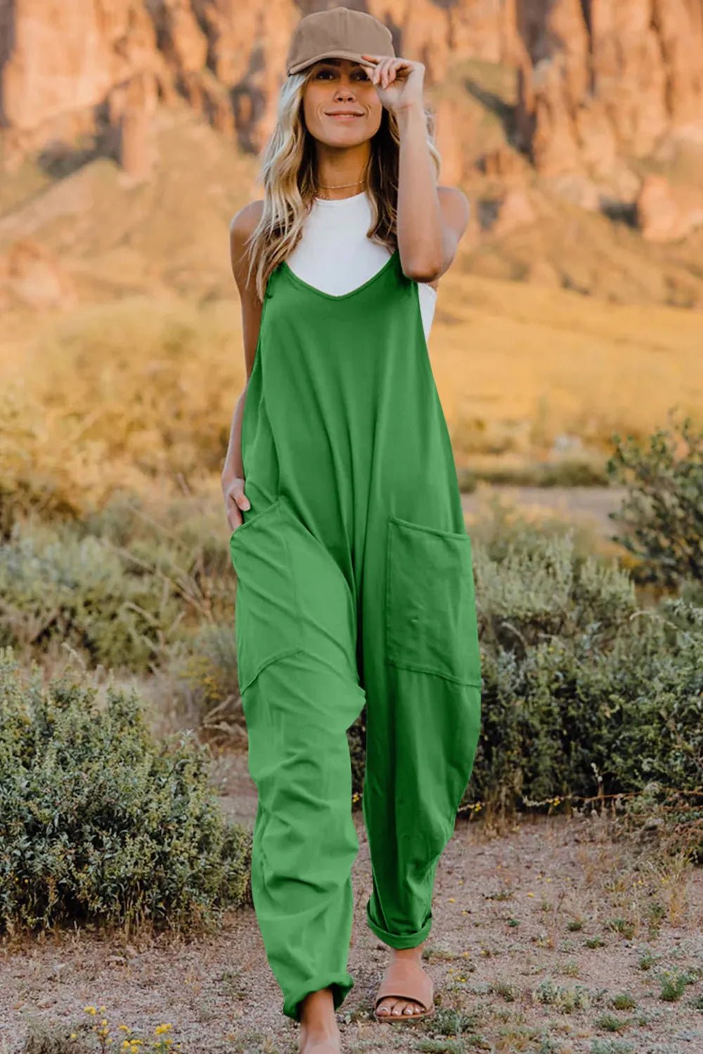 Women's V-neck sleeveless jumpsuit with pockets, lightweight casual romper, stylish and comfortable for warm weather.