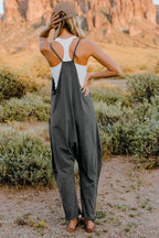 Women's lightweight V-neck sleeveless jumpsuit with pockets, casual romper from Trendsi, shown in full size.