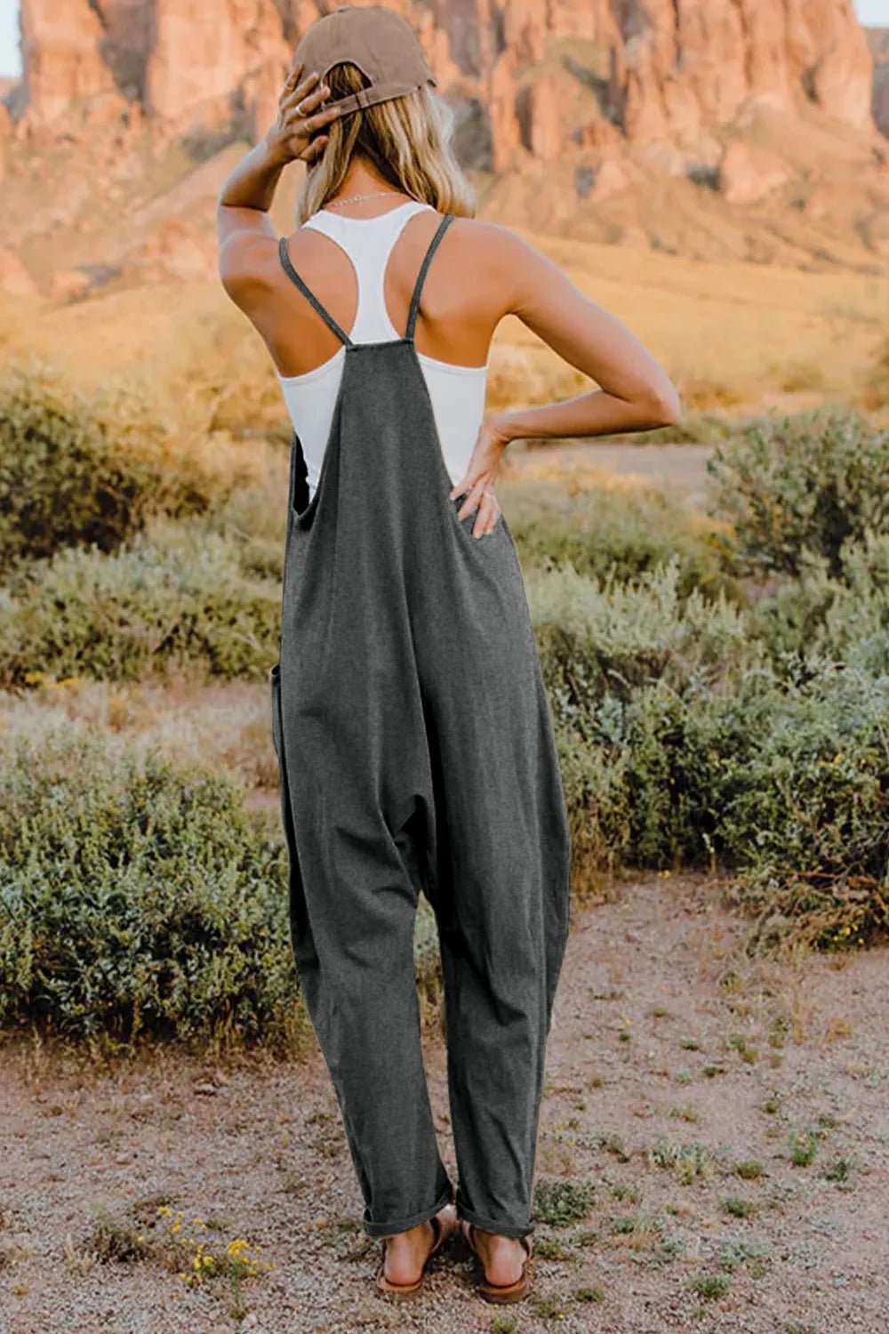 Women's lightweight V-neck sleeveless jumpsuit with pockets, casual romper from Trendsi, shown in full size.