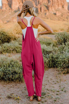 Women's V-neck sleeveless jumpsuit with pockets, lightweight casual romper from Trendsi, shown in full size.