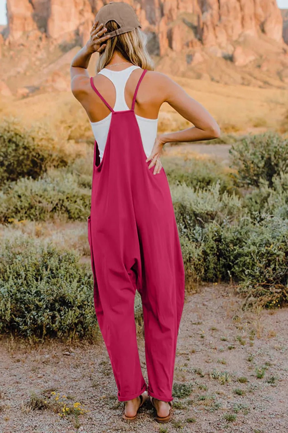 Women's V-neck sleeveless jumpsuit with pockets, lightweight casual romper from Trendsi, shown in full size.