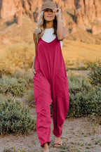 Women's lightweight sleeveless V-neck jumpsuit with pockets, casual romper from Trendsi, perfect for summer wear.