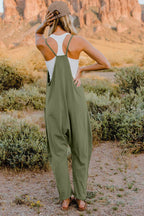 Women's lightweight V-neck sleeveless jumpsuit with pockets, casual romper from Trendsi, perfect for comfortable summer wear.