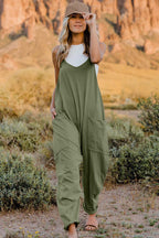 Women's lightweight sleeveless V-neck jumpsuit with pockets, casual romper, from Trendsi, shown in a full-length image.