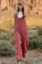 Women's lightweight V-neck sleeveless jumpsuit with pockets, casual romper by Trendsi, showcasing front view and comfortable fit.