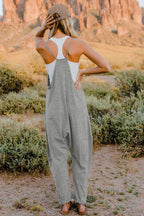 Women's lightweight sleeveless V-neck jumpsuit with pockets, casual romper by Trendsi, shown in full size with a relaxed fit.