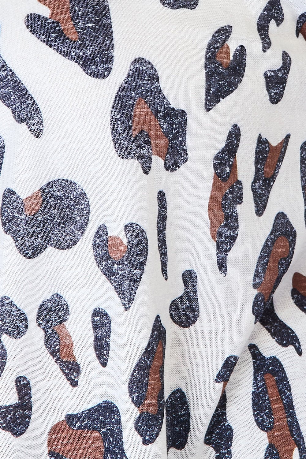 Women's leopard print long sleeve knit cardigan by Plush Fashion Hub, soft and cozy layering piece with stylish animal print design.
