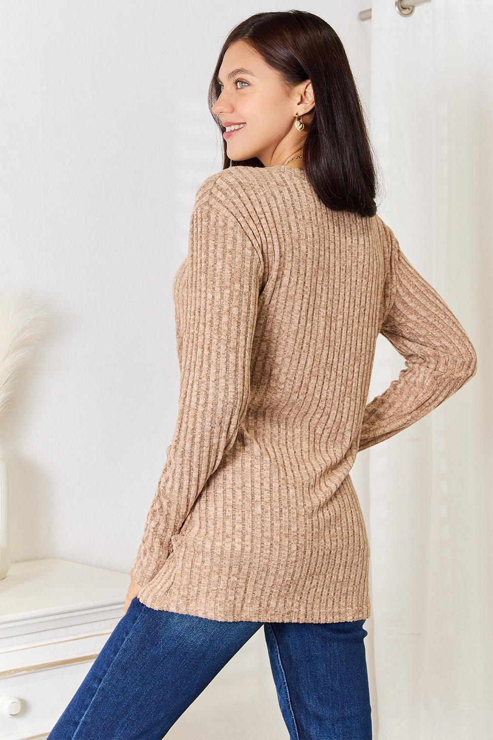 Women's ribbed long sleeve notched neck slim fit casual top by Plush Fashion Hub, shown in a close-up of the stylish neckline and fit.