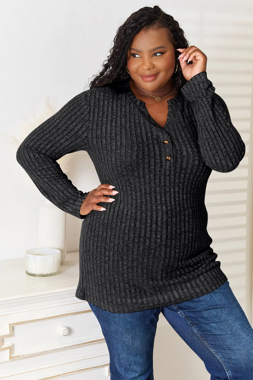Women's ribbed long sleeve notched neck slim fit casual top by Plush Fashion Hub, shown in a close-up of the stylish neckline and fabric.