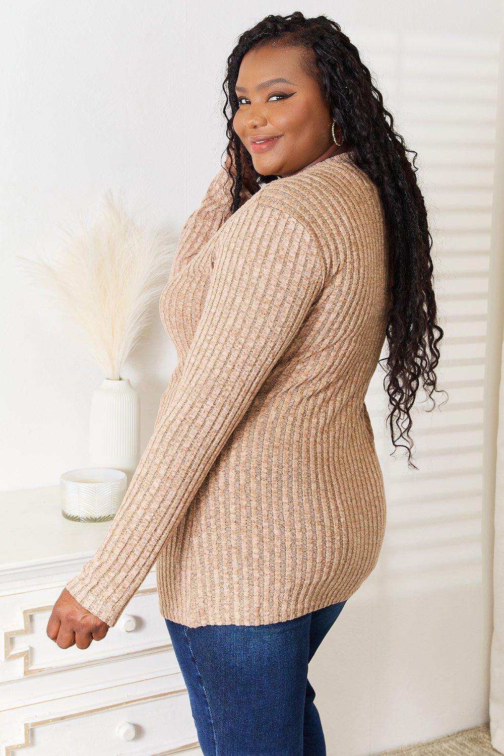Women's ribbed long sleeve notched neck slim fit casual top by Plush Fashion Hub, featuring a stylish notched neckline and fitted design.