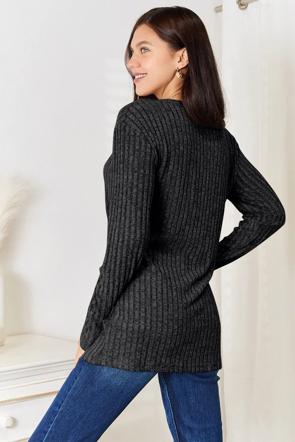 Women’s ribbed long sleeve top with notched neckline, slim fit, casual style from Plush Fashion Hub.