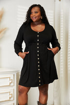 Women's long sleeve empire waist dress with pockets and scoop neck, midi length, from Trendsi, stylish and comfortable women's apparel.