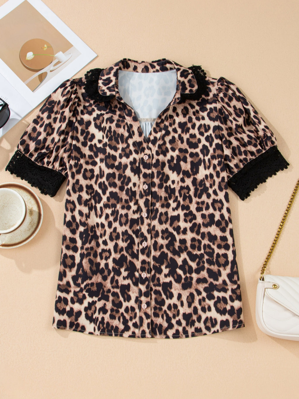 Leopard print short sleeve blouse by Trendsi with lace trim and button front, stylish top for casual or dressy wear.