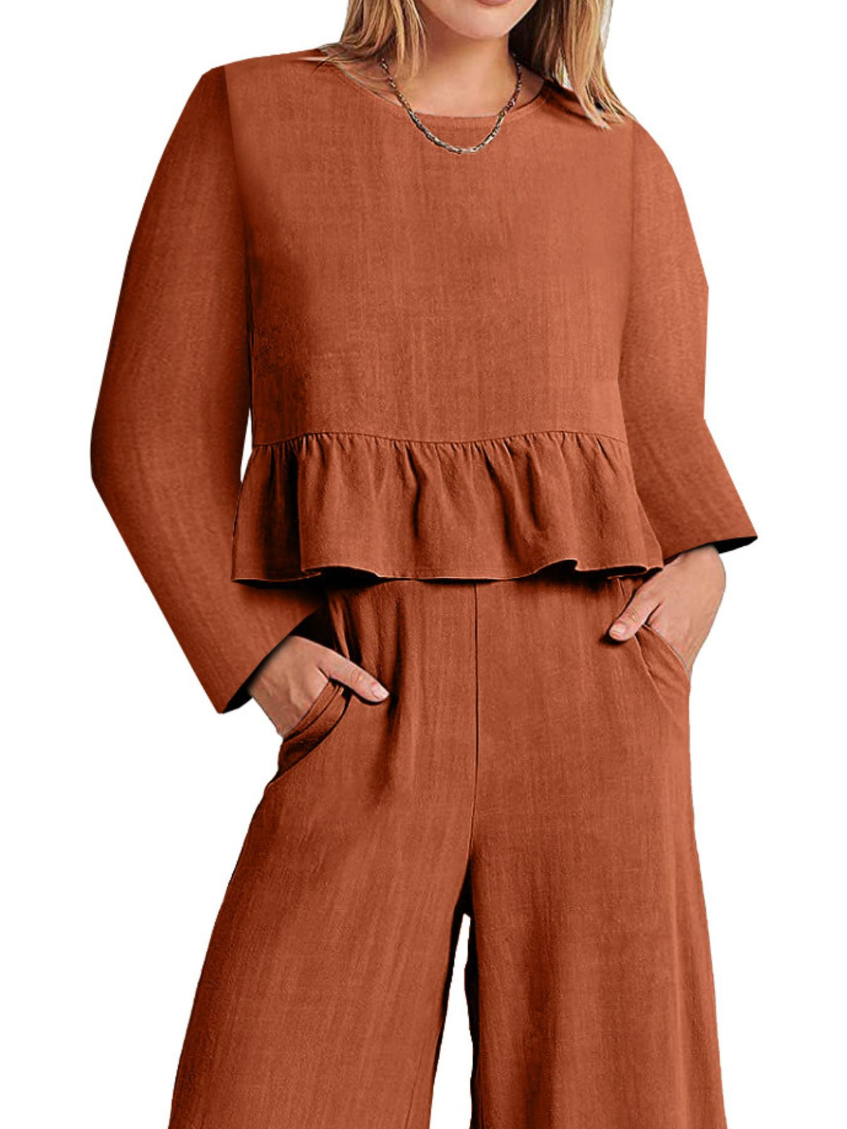 Women's long sleeve ruffled hem top and pants lounge set with pockets by Plush Fashion Hub, stylish and comfortable two-piece outfit.
