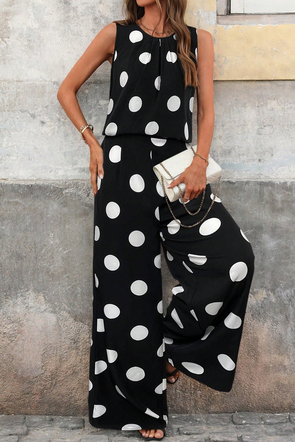 Polka dot sleeveless loungewear top and wide-leg pants set by Plush Fashion Hub, featuring a stylish two-piece design.