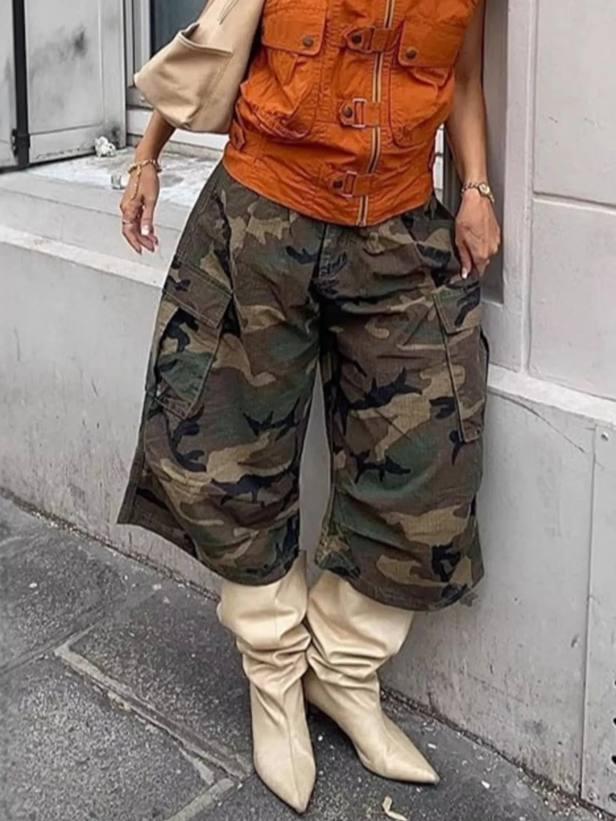 Camouflage cargo cropped pants by Plush Fashion Hub featuring multiple pockets and a relaxed fit, perfect for casual wear.
