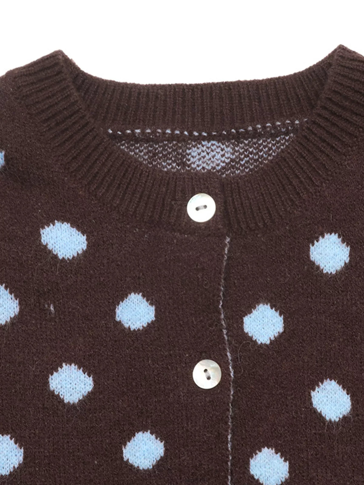 Women’s polka dot button-up cardigan from Trendsi, featuring a soft knit fabric, long sleeves, and a classic button-front design.