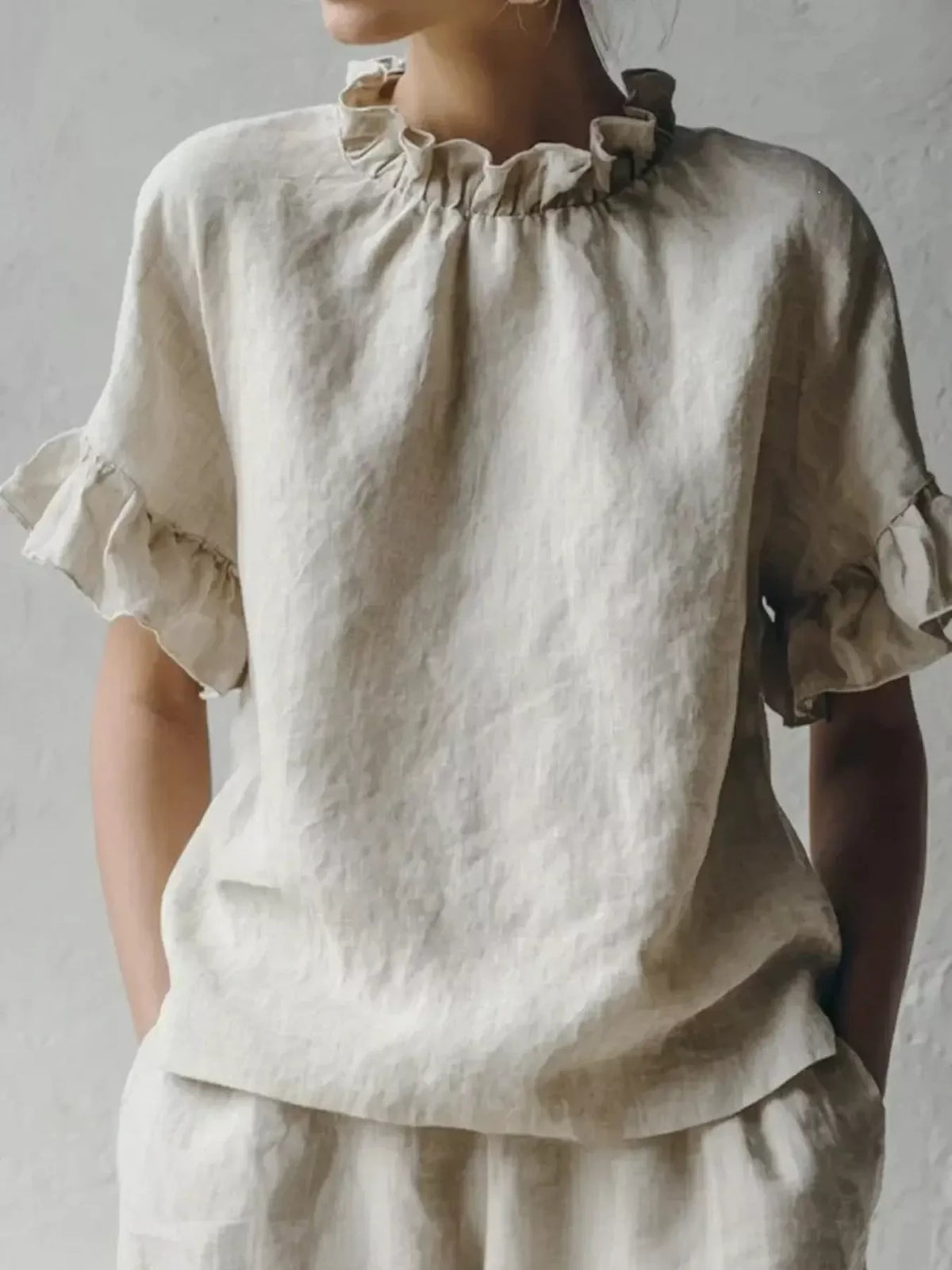 Plus size ruffled neck blouse by Plush Fashion Hub featuring half sleeves and a full-length design in a stylish, comfortable fit.