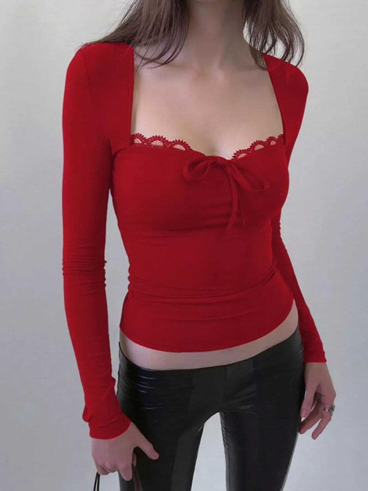 Lace trim long sleeve t-shirt from Plush Fashion Hub featuring delicate lace accents on a comfortable top.