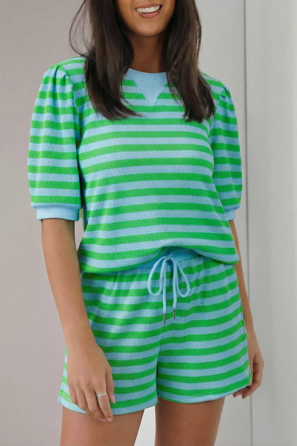 Stripe colorblock puff sleeve top and drawstring shorts matching set by Plush Fashion Hub, featuring vibrant colors and casual style.