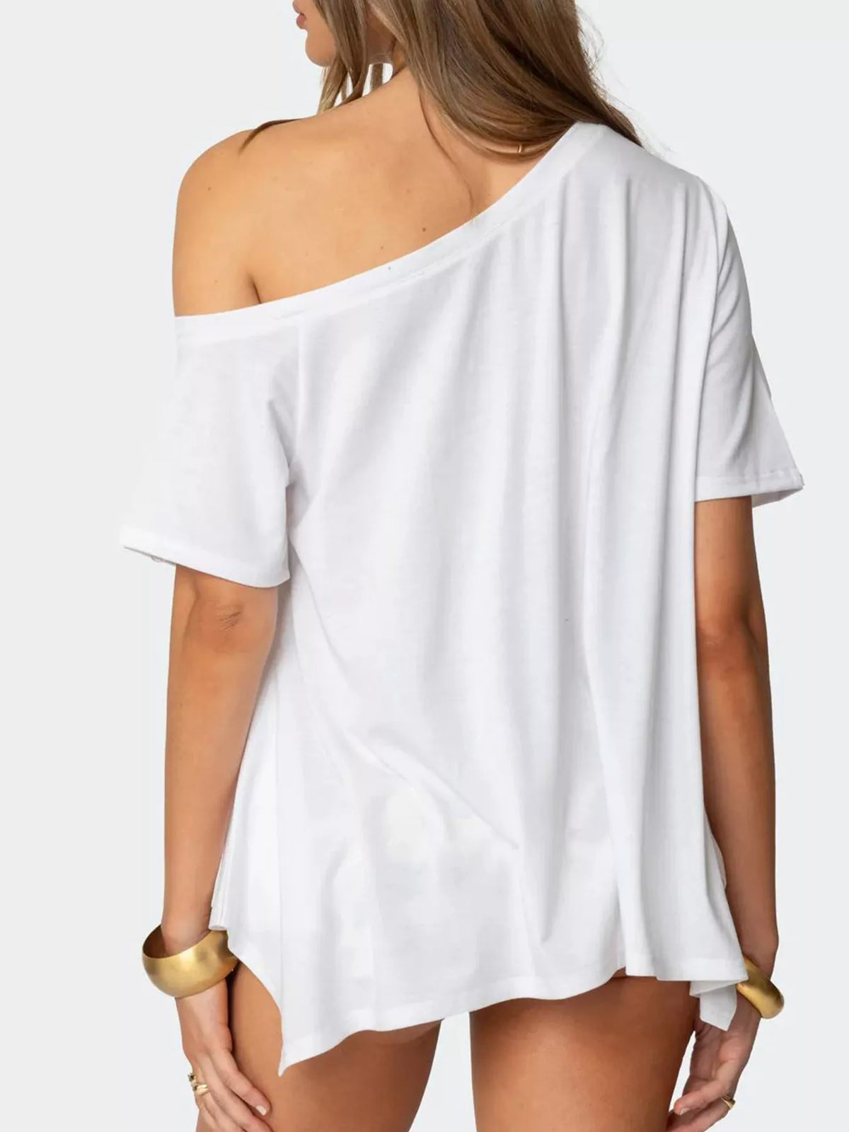 Women's off-shoulder asymmetrical flowy T-shirt from Plush Fashion Hub, with a relaxed fit and stylish draped design.