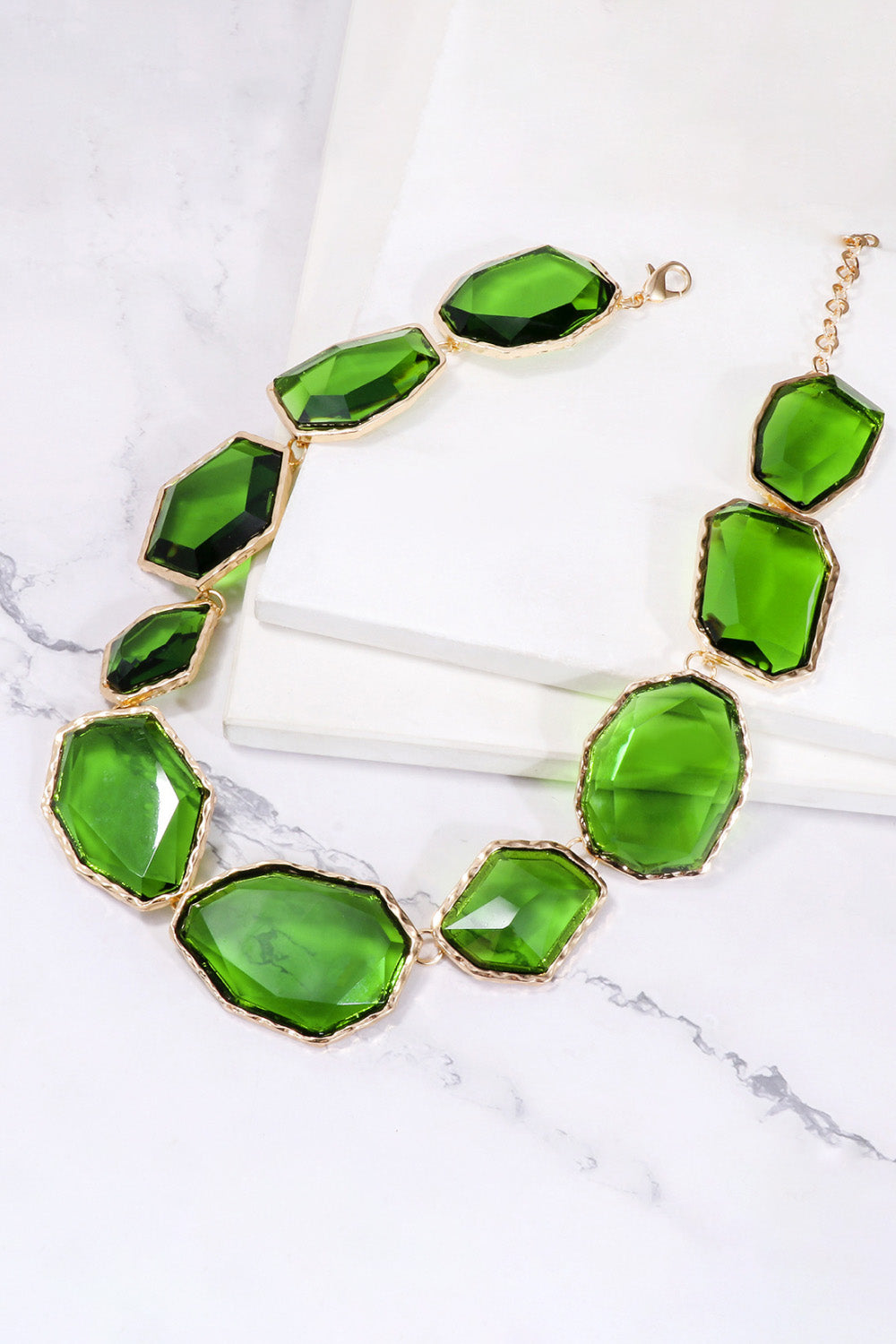 Geometrical resin necklace with zinc alloy frame, featuring colorful shapes, from Plush Fashion Hub.