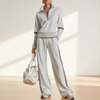 Women’s casual long sleeve two-piece sports set by FitiqueFit, featuring comfortable matching top and leggings for activewear.