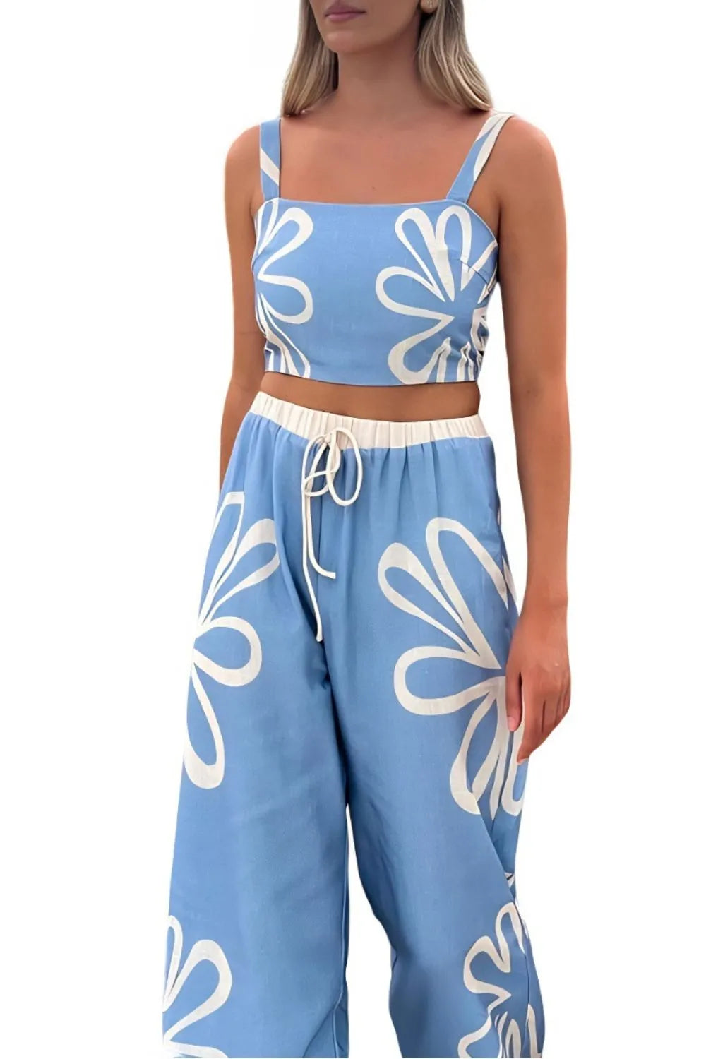 Smocked square neck cami and pants loungewear set by Trendsi featuring a coordinated soft fabric in neutral tones.