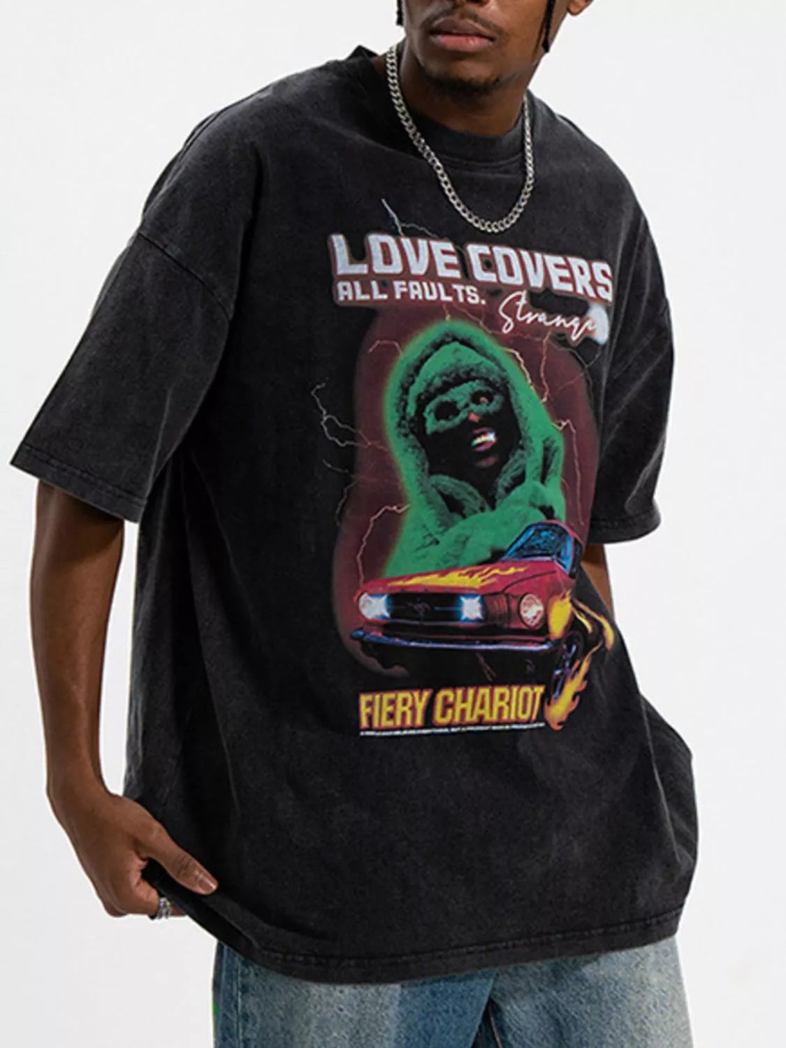 Men's graphic round neck short sleeve T-shirt from Trendsi, featuring a stylish printed design on soft fabric.