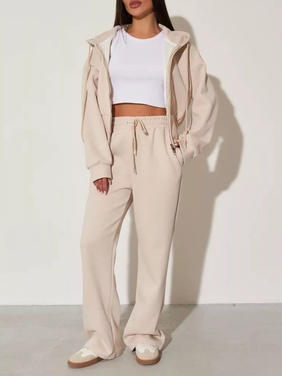 Plush Fashion Hub zip-up hoodie and wide-leg pants loungewear set, featuring comfortable fabric and casual style.