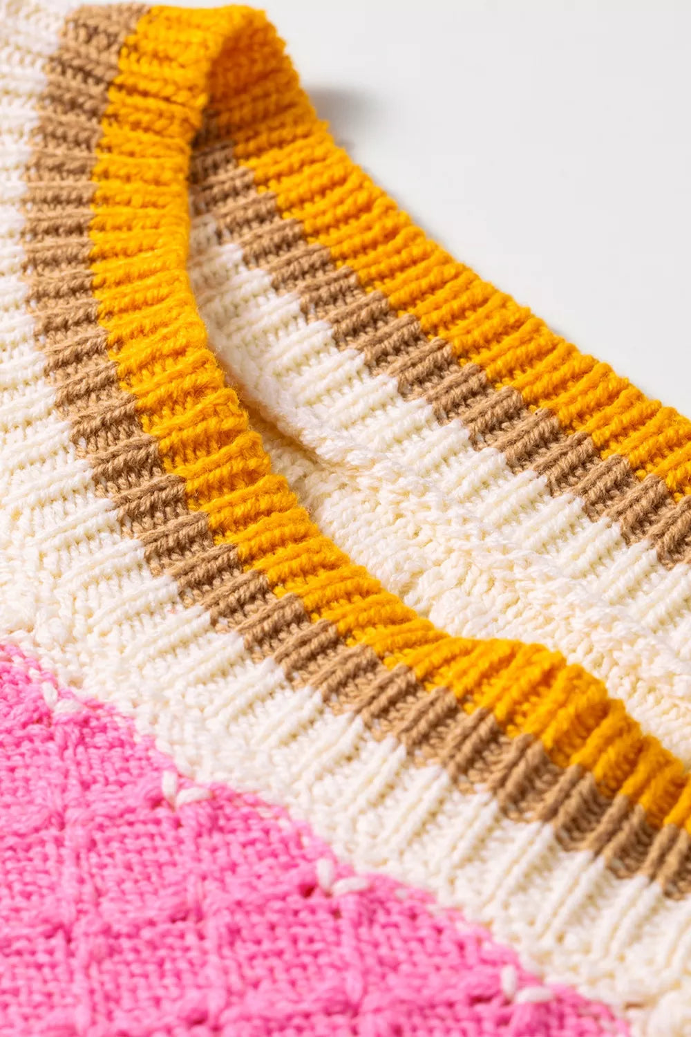Women's striped colorblock textured drop shoulder sweater by Trendsi, showcasing its cozy knit and stylish design.