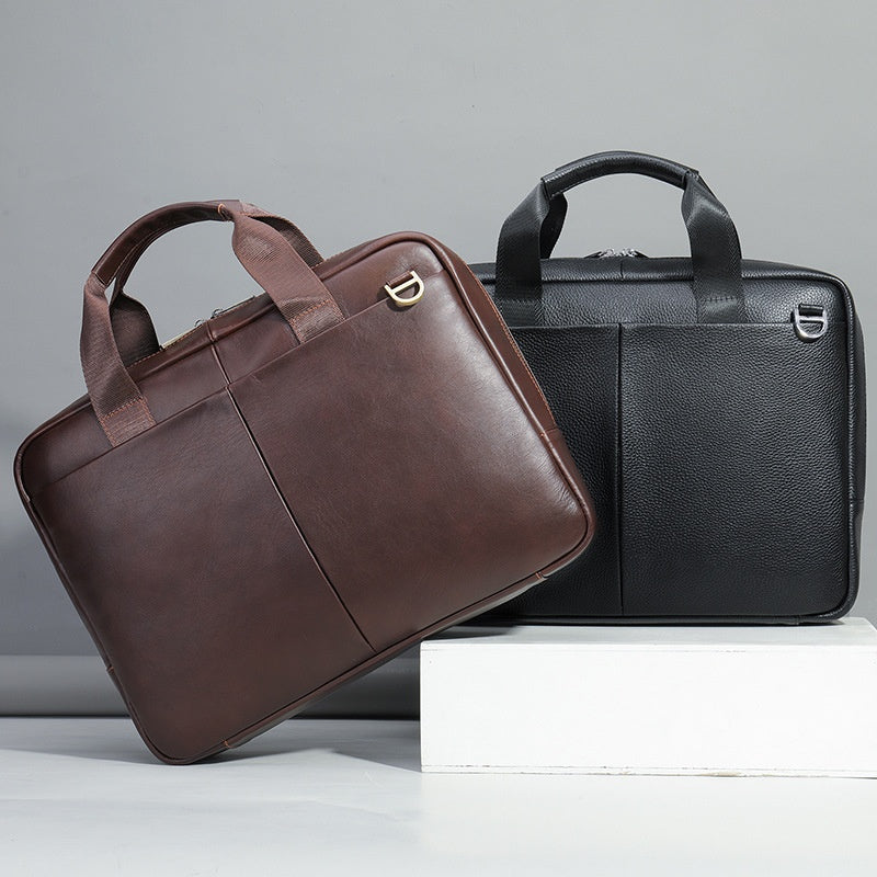 Genuine leather Pi-Mart large capacity men's briefcase with horizontal design, cowhide exterior, and computer storage pocket.