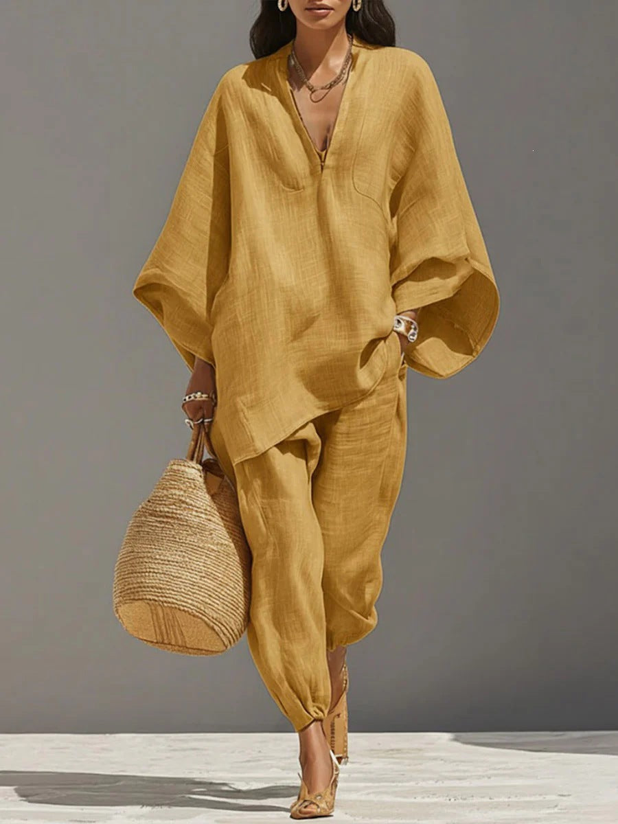 Women's loose shirt and cropped pants casual two-piece set by Plush Fashion Hub, featuring vintage-inspired relaxed fit clothing.