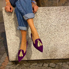 Women's suede pointed toe tassel flats by Plush Fashion Hub, featuring a shallow mouth and low heel for casual style.