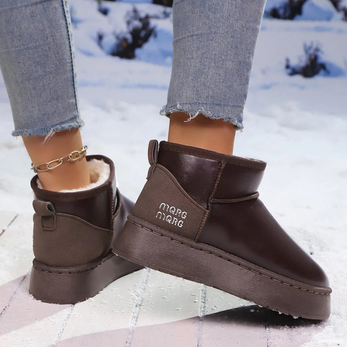 Faux-fur platform ankle boots by Trendsi featuring a stylish design with chunky heels and cozy faux-fur lining.