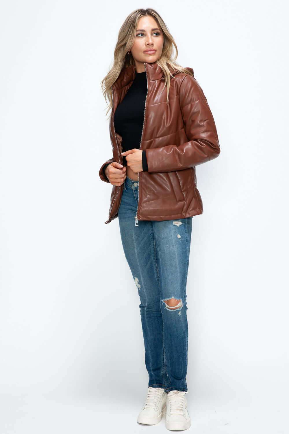 Pocketed zip-up puffer jacket with removable hood in brown pleather.