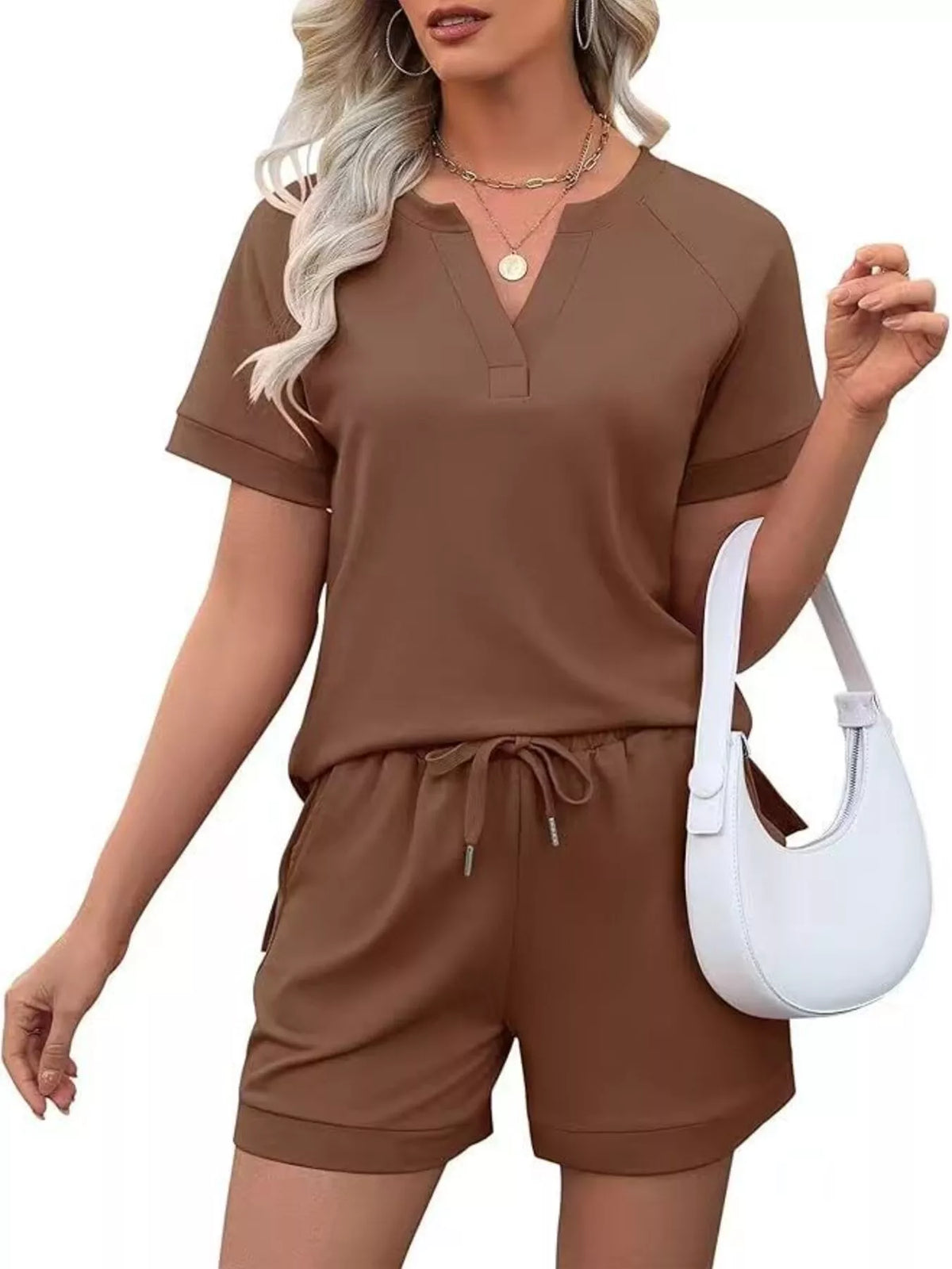 Plush Fashion Hub solid color short sleeve top and matching shorts two-piece apparel set, casual summer outfit for women.