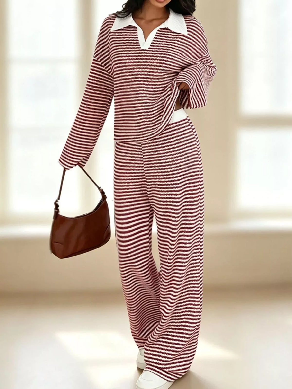 Striped long sleeve polo and wide-leg pants set by Trendsi, featuring a stylish, coordinated outfit with bold stripes and comfortable fit.
