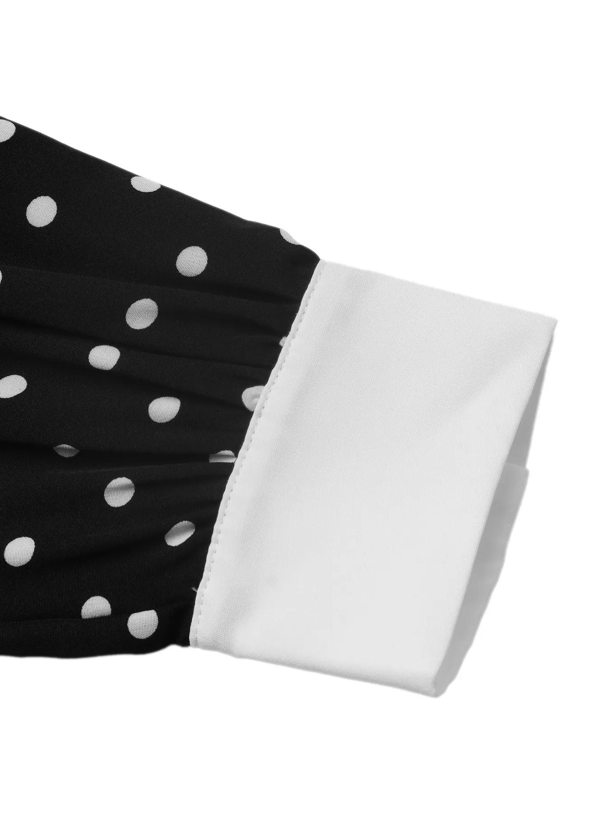 Polka dot Peter Pan collar dress by Plush Fashion Hub featuring a classic style and playful design, shown in the product image.
