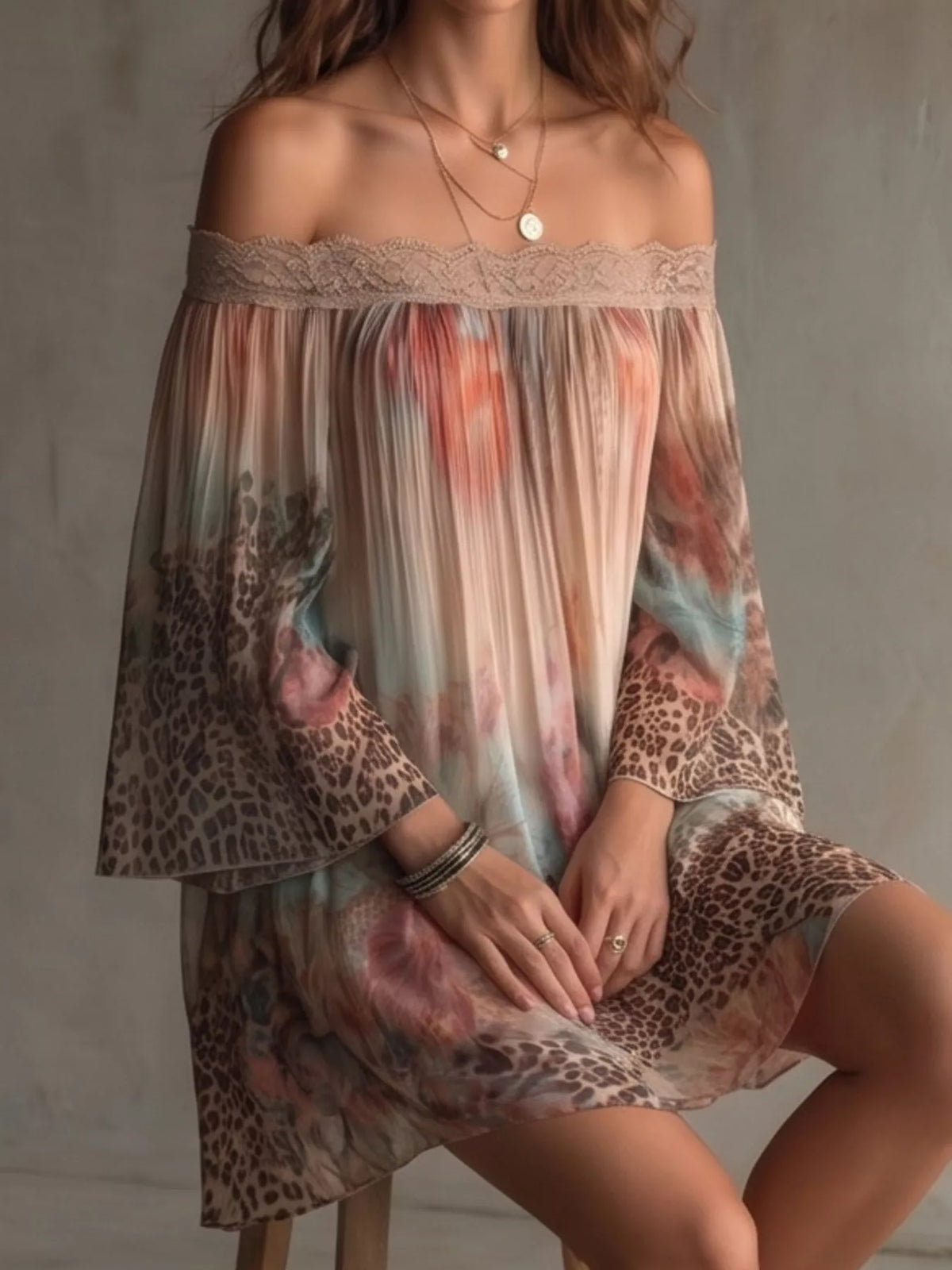 Off-shoulder floral and leopard print mini dress with lace trim from Trendsi, featuring a stylish, feminine design.