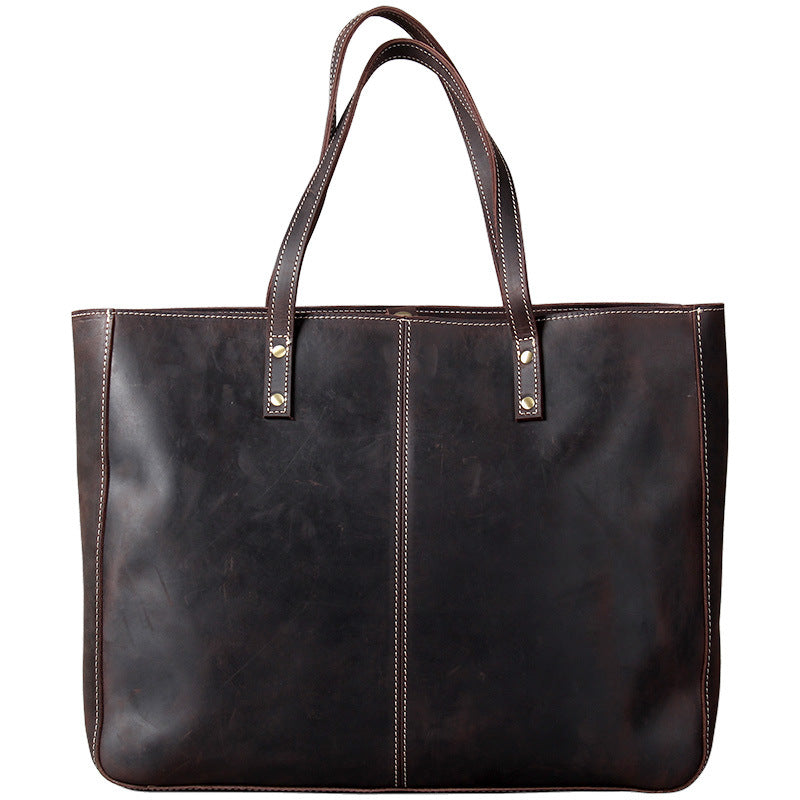 Simple retro first layer cowhide large-capacity men's handbag by Pi-Mart, featuring a classic design and spacious interior.