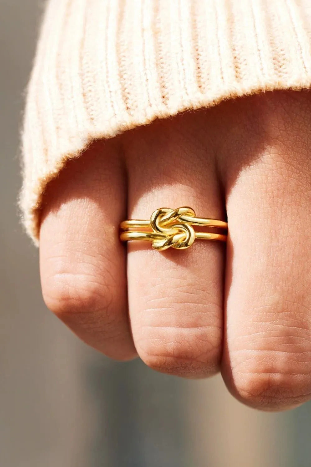 Sterling silver knotted ring from Plush Fashion Hub featuring a polished, intertwined design in 925 silver.