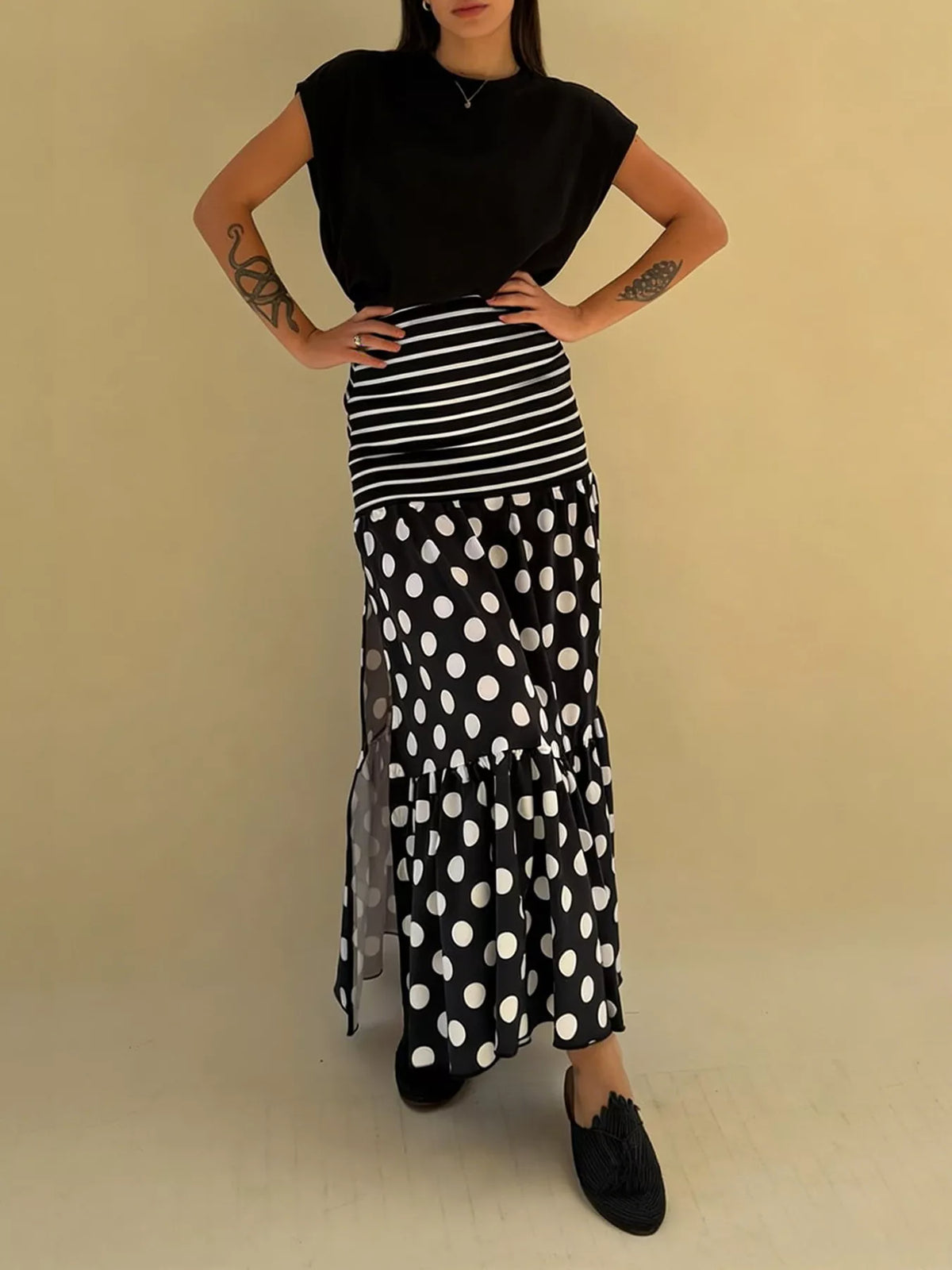Flowy women’s polka dot and striped maxi skirt by Plush Fashion Hub with a slit, casual bohemian style, and lightweight fabric.