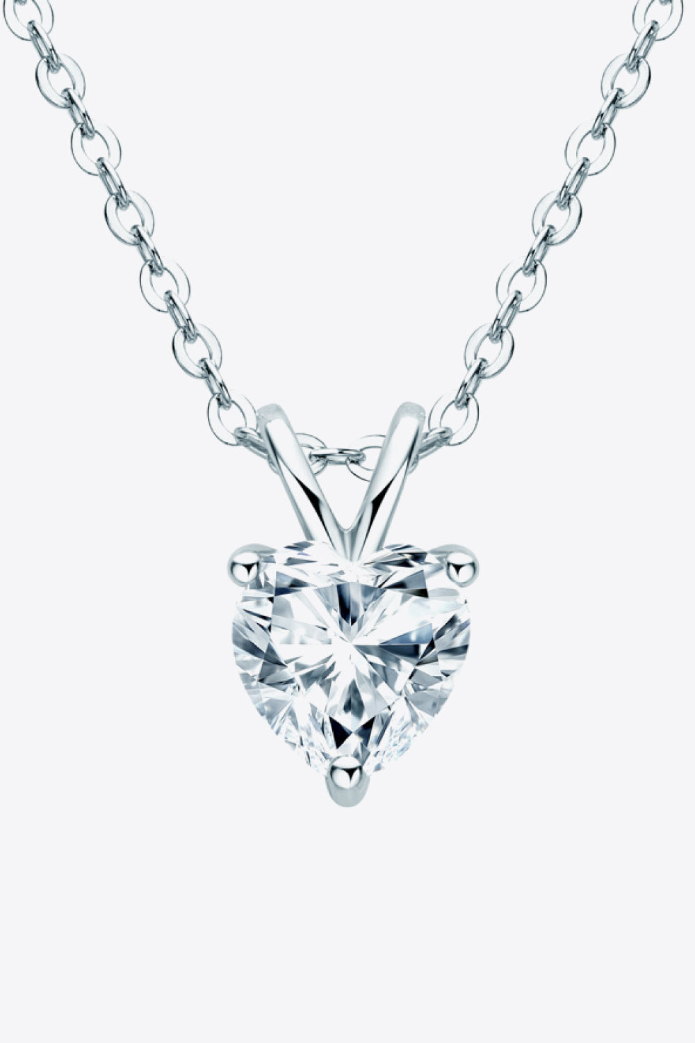 Heart-shaped 1-carat moissanite pendant necklace from Plush Fashion Hub, featuring a sparkling heart-shaped gemstone on a delicate chain.
