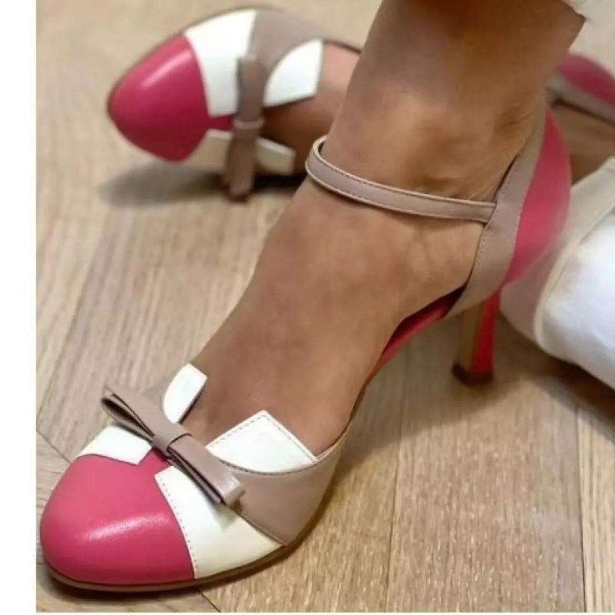 Plush Fashion Hub bow round toe mid heel sandals featuring elegant straps and a stylish design.