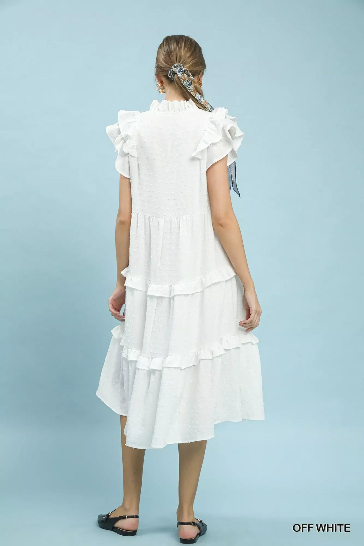 Umgee textured ruffle sleeve tiered midi dress, stylish and feminine, featuring layered fabric and a flattering silhouette.