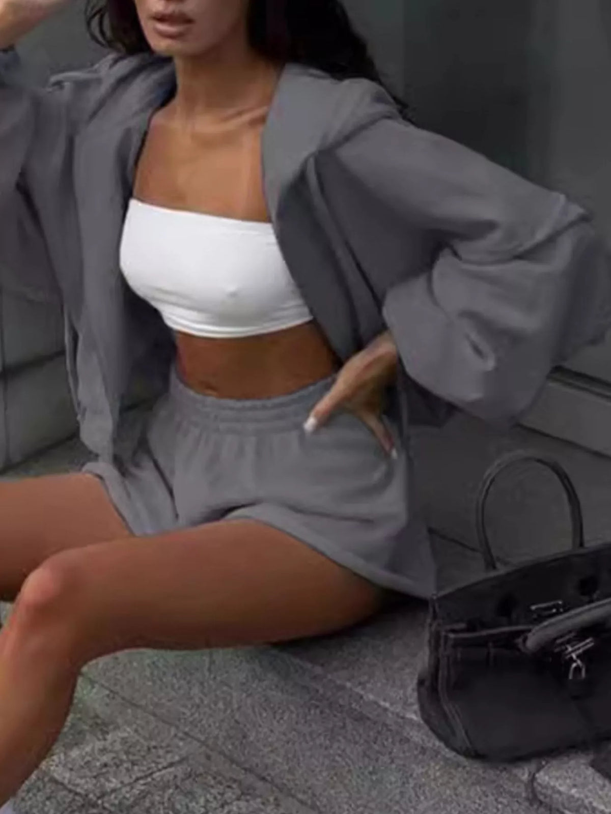 Plush Fashion Hub zip-up long sleeve outerwear and matching shorts set, shown in a stylish casual outfit.