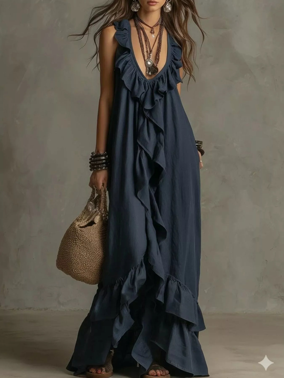 Plush Fashion Hub ruffled sleeveless maxi dress in flowing fabric, featuring a fitted bodice and tiered ruffle details.